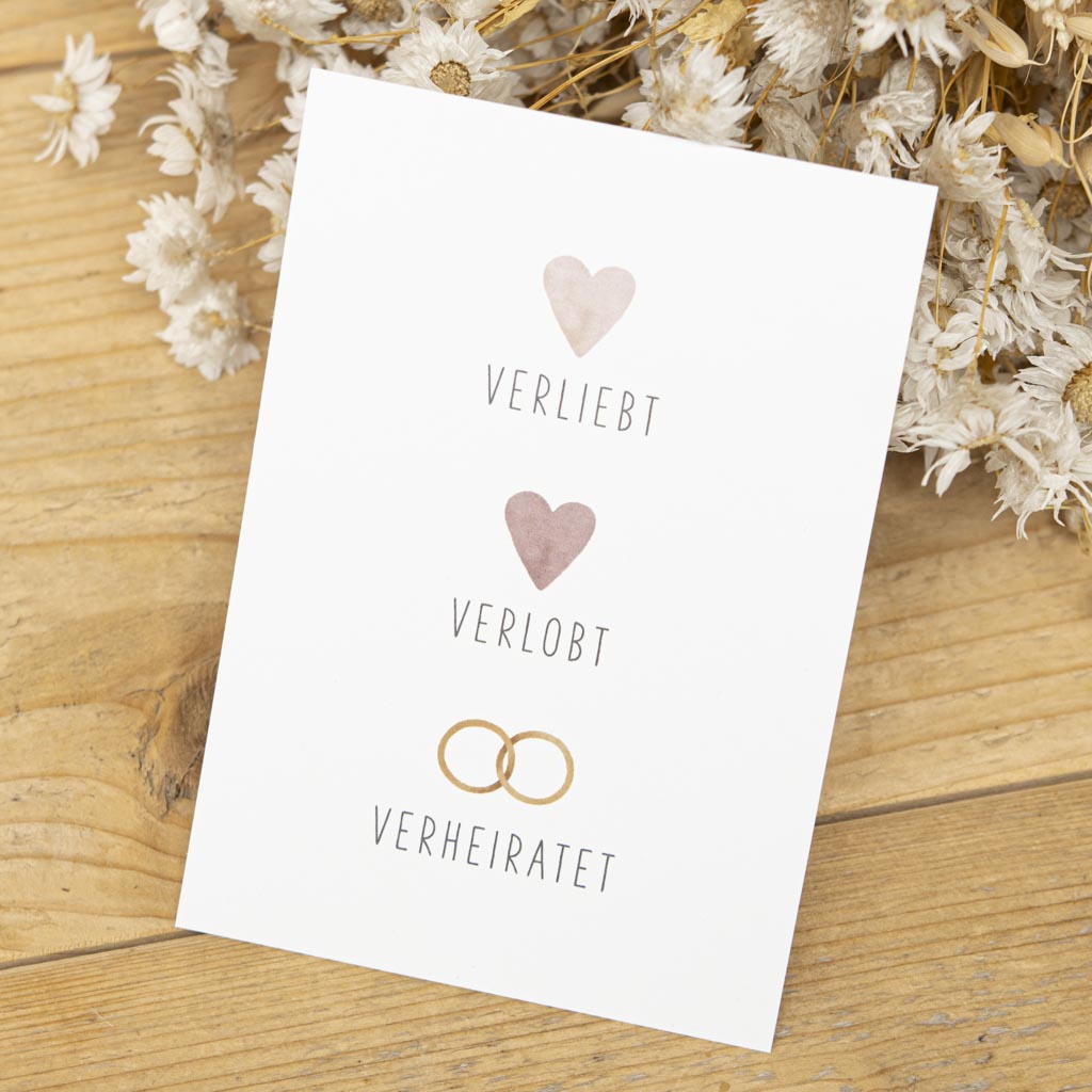 Grußkarte Hochzeit mit Herzen und Ringen