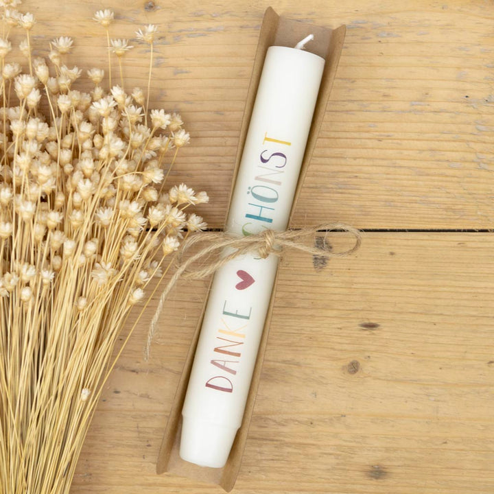 Stabkerze Dankeschön in Creme mit Kraftpapierverpackung und Jutekordel