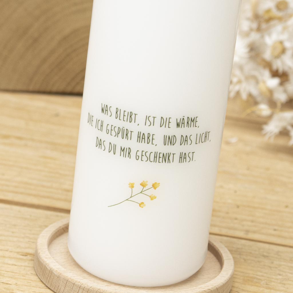 Rückseite der Trauerkerze Sonnenblume mit persönlichem Spruch