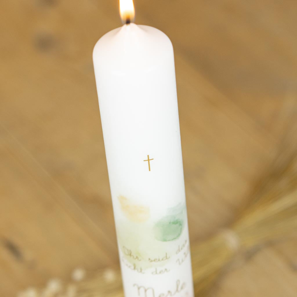 Goldenes Kreuz auf der Kommunionkerze Sonne