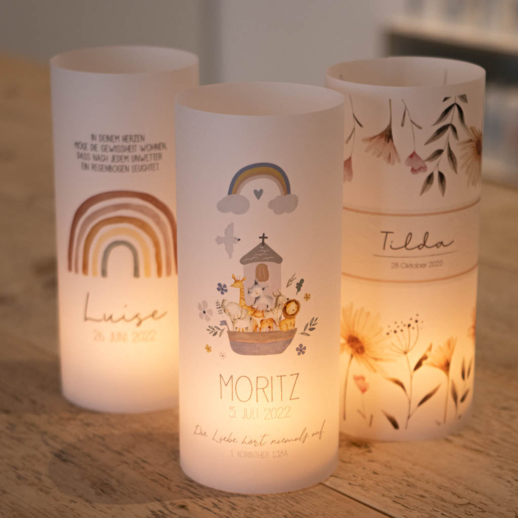 3 Lichthüllen zur Taufe mit unterschiedlichen Motiven als Beispiel - sie leuchten